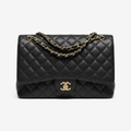 Chanel Maxi Single Flap – front view, black caviar leather, gold hardware